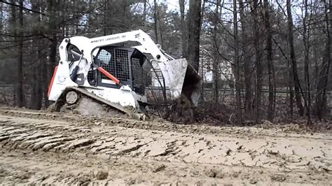 stuck skid steer|skid steer rear end unstuck.